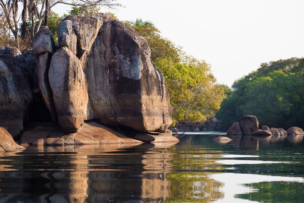 Granite boulders rise from the Kafue River near KaingU Safari Lodge.