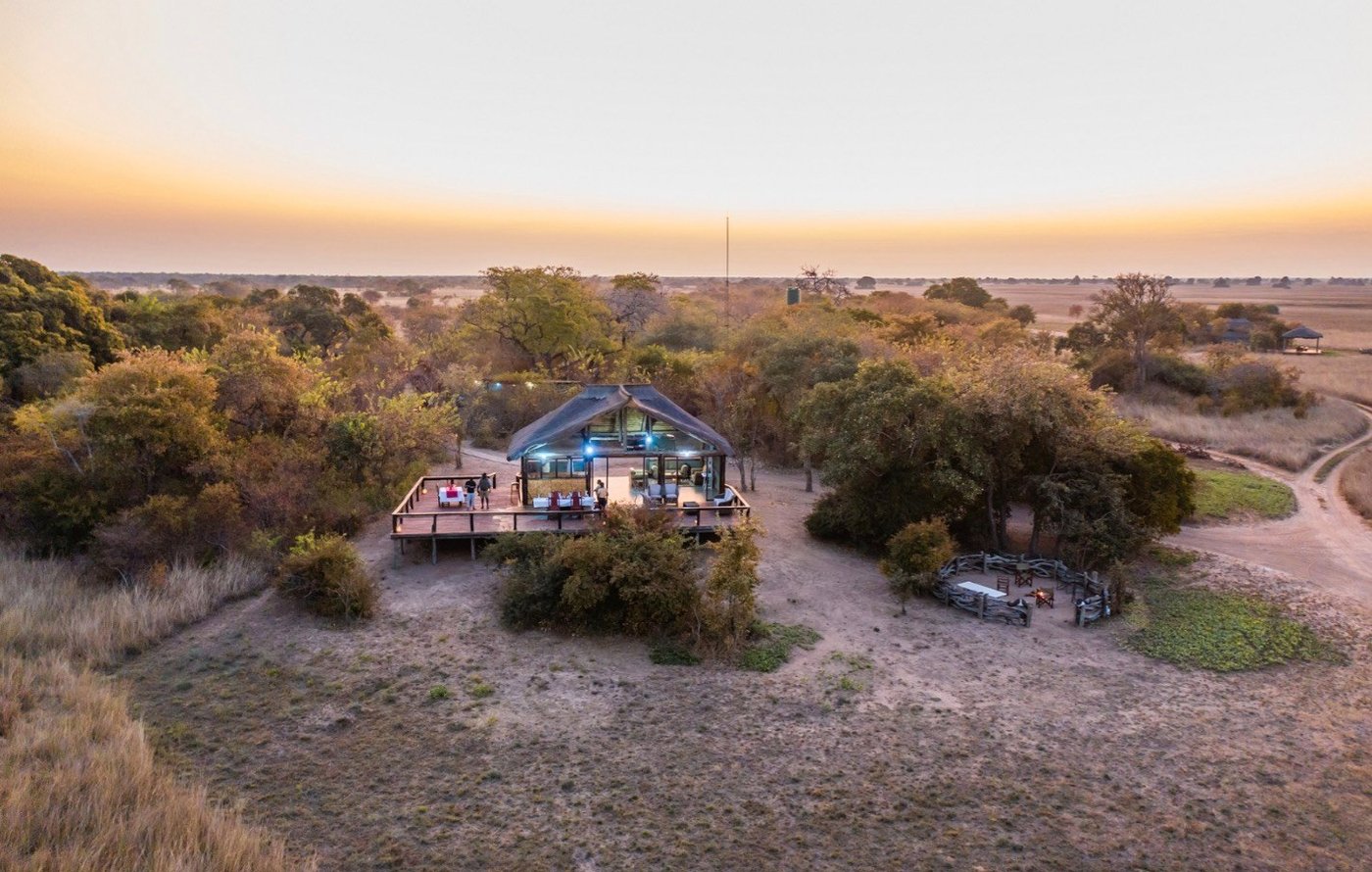 Aerial view shows the tented camp nestled among trees at Kasonso Busanga Camp in Kafue.