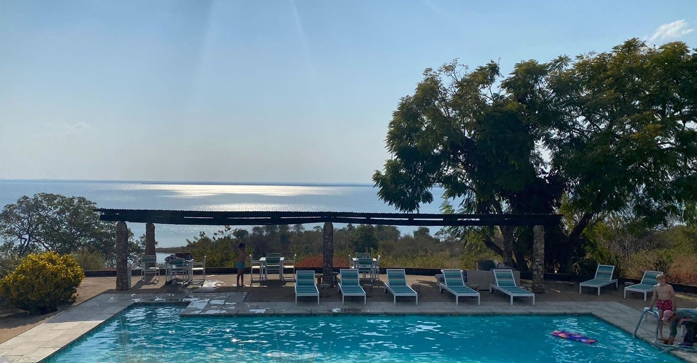 The pool deck looks out over Lake Itezhi-Tezhi at Musungwa Safari Lodge.